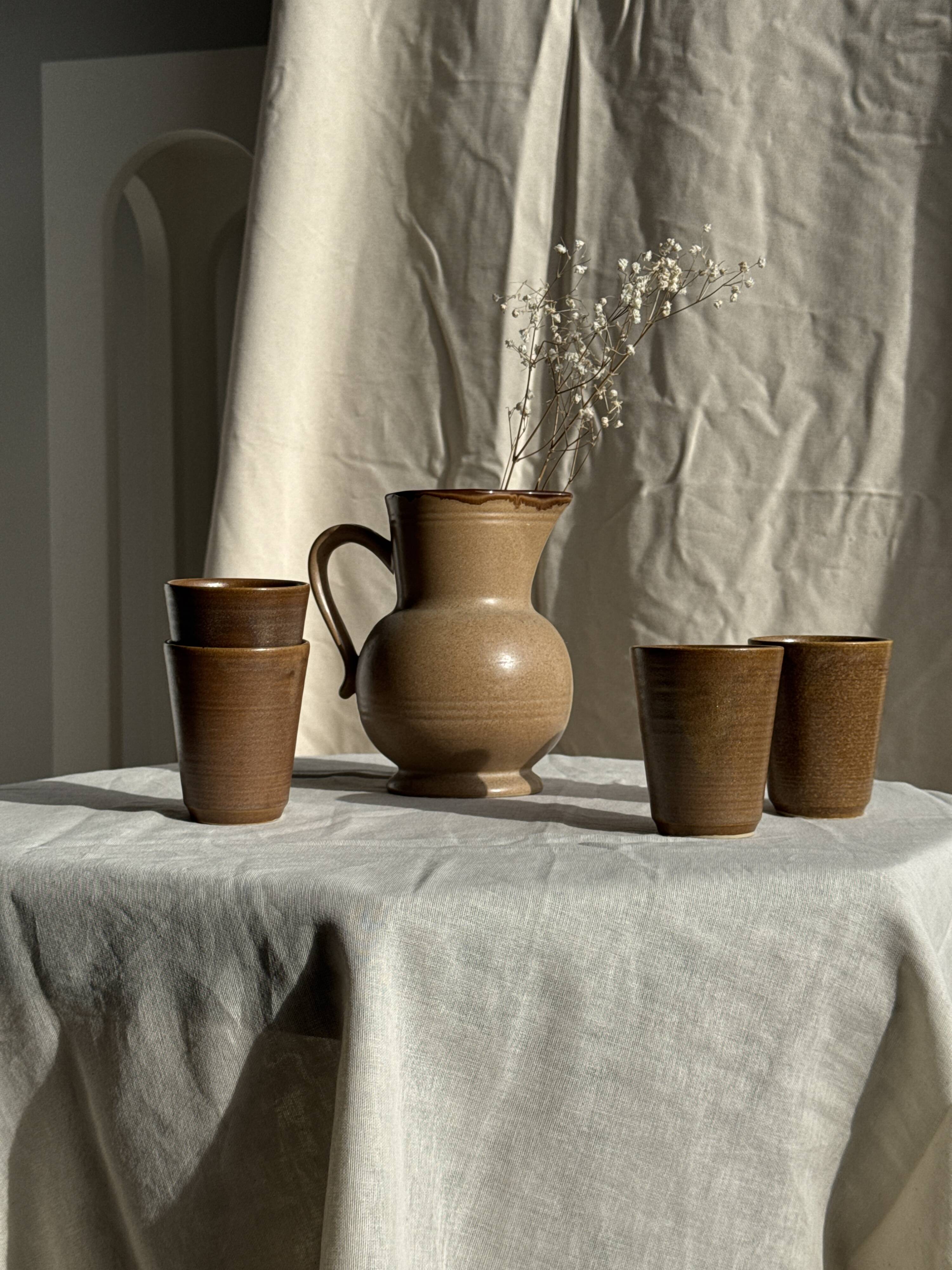 Set of 10 small stoneware mugs from Digoin.