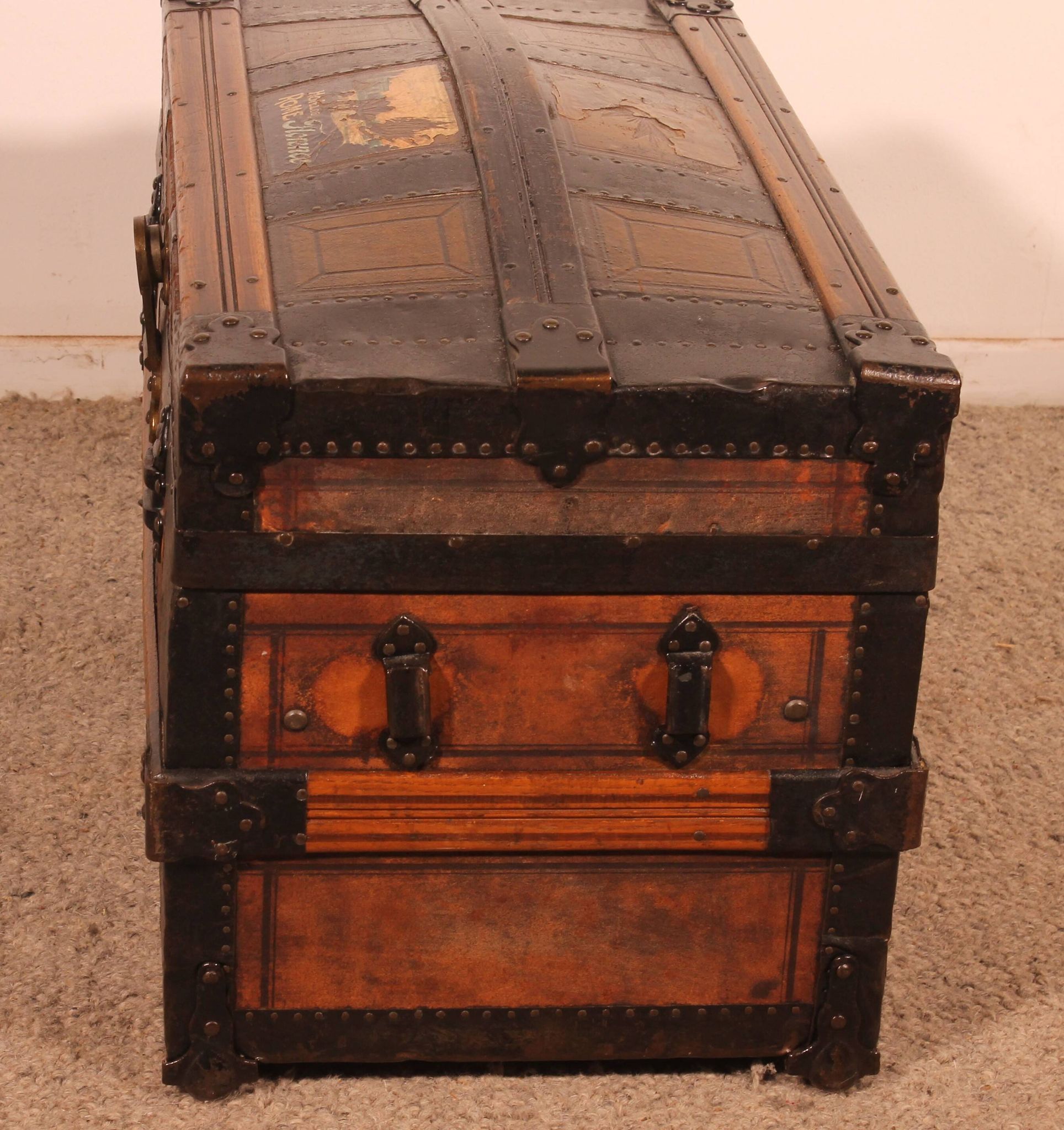 travel trunk from the early 20th century made of leather and wood