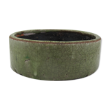 Bowl or empty pocket in cracked green sandstone varnish raku