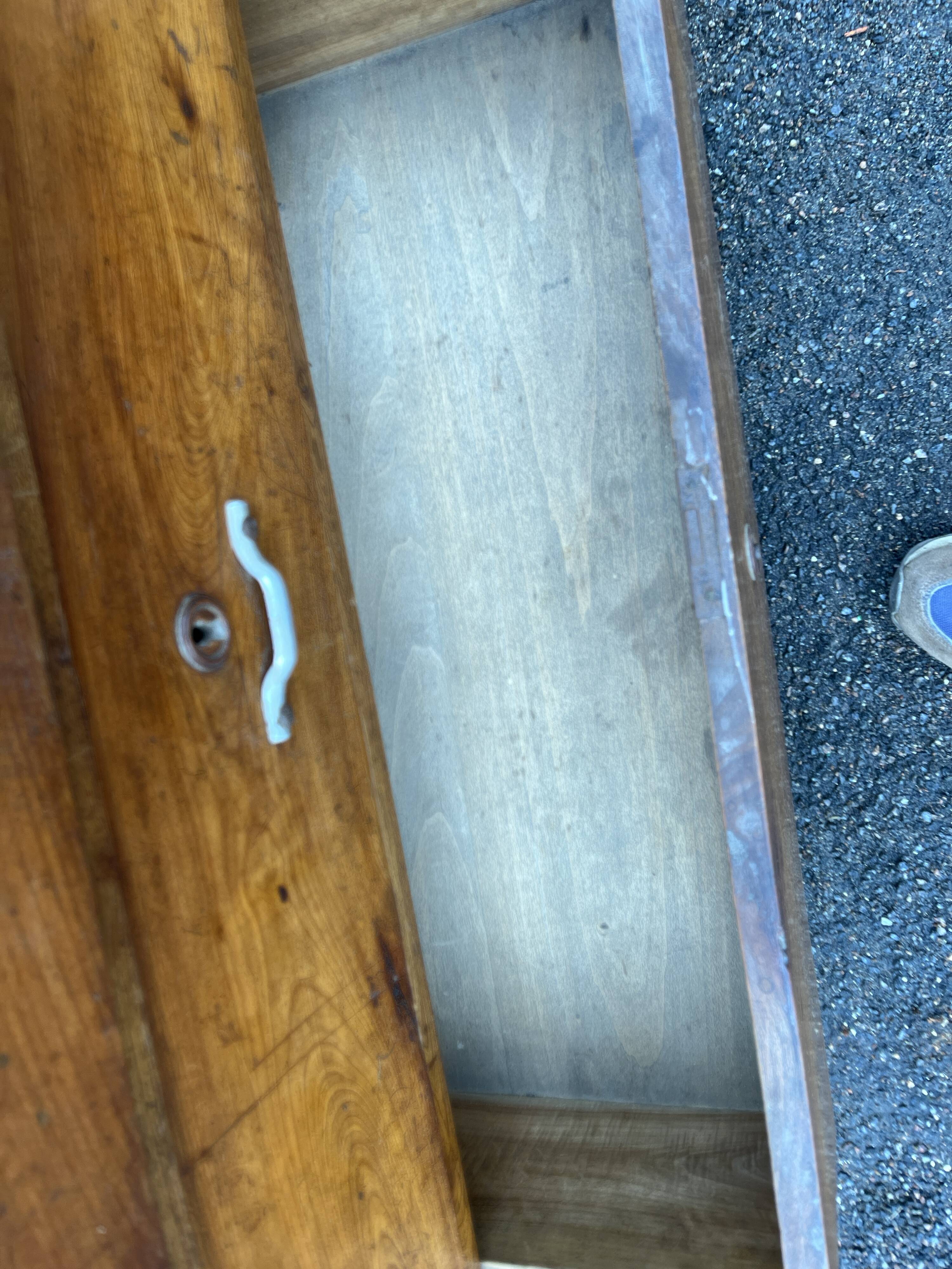 Antique 19th-century wooden chest of drawers with a marble top