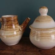 Sugar bowl and milk jug in Longchamp earthenware.