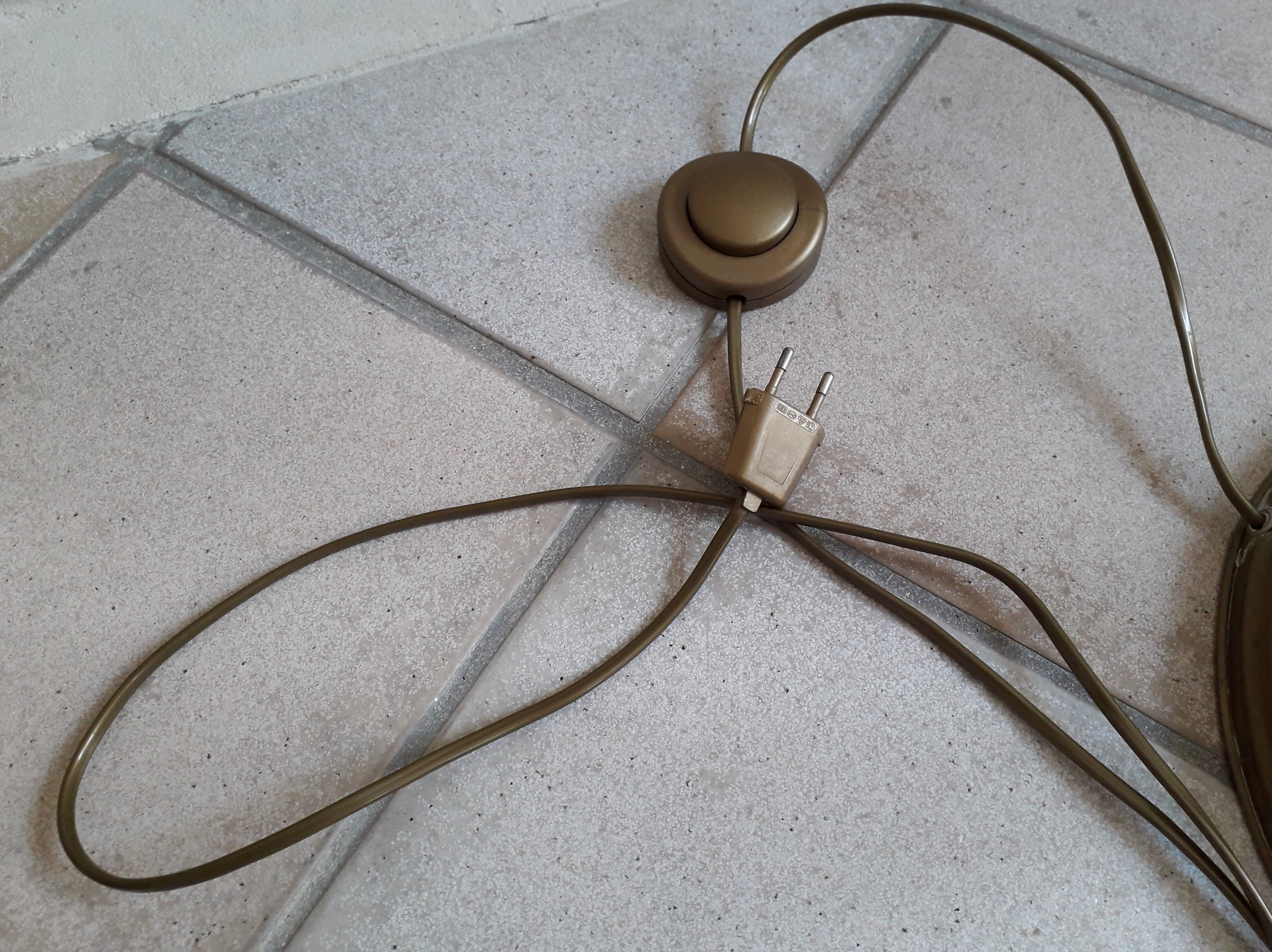 Articulated brass floor lamp