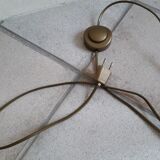 Articulated brass floor lamp