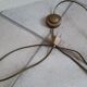 Articulated brass floor lamp