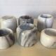 Six bougeoirs en marbre