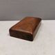 Wooden trinket box for storing jewellery, cigarettes or similar items.