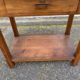Vintage farmhouse dessert trolley on wheels made of solid wood from the 19th century.