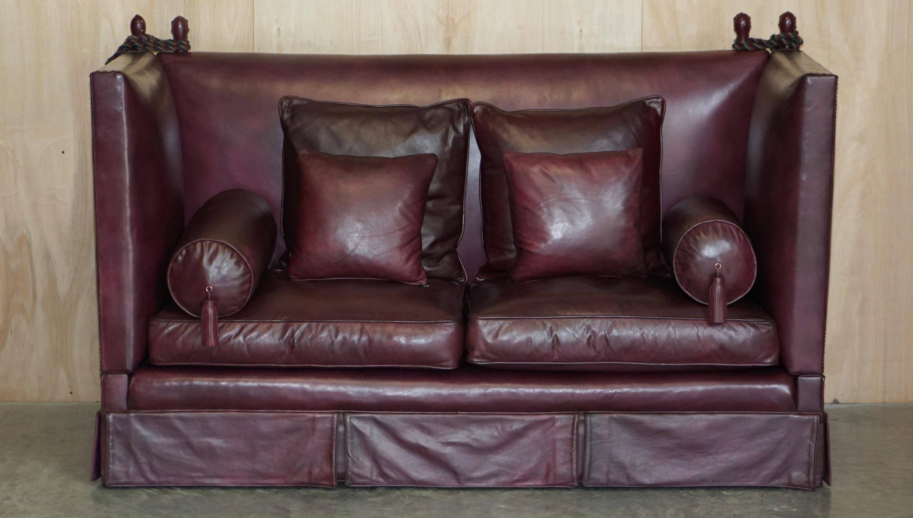 Victorian Knole canapé restored in leather with feather cushions.