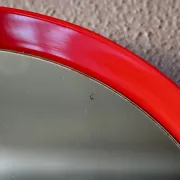 Round Pop Art mirror from the 60s-70s in bright red plastic.