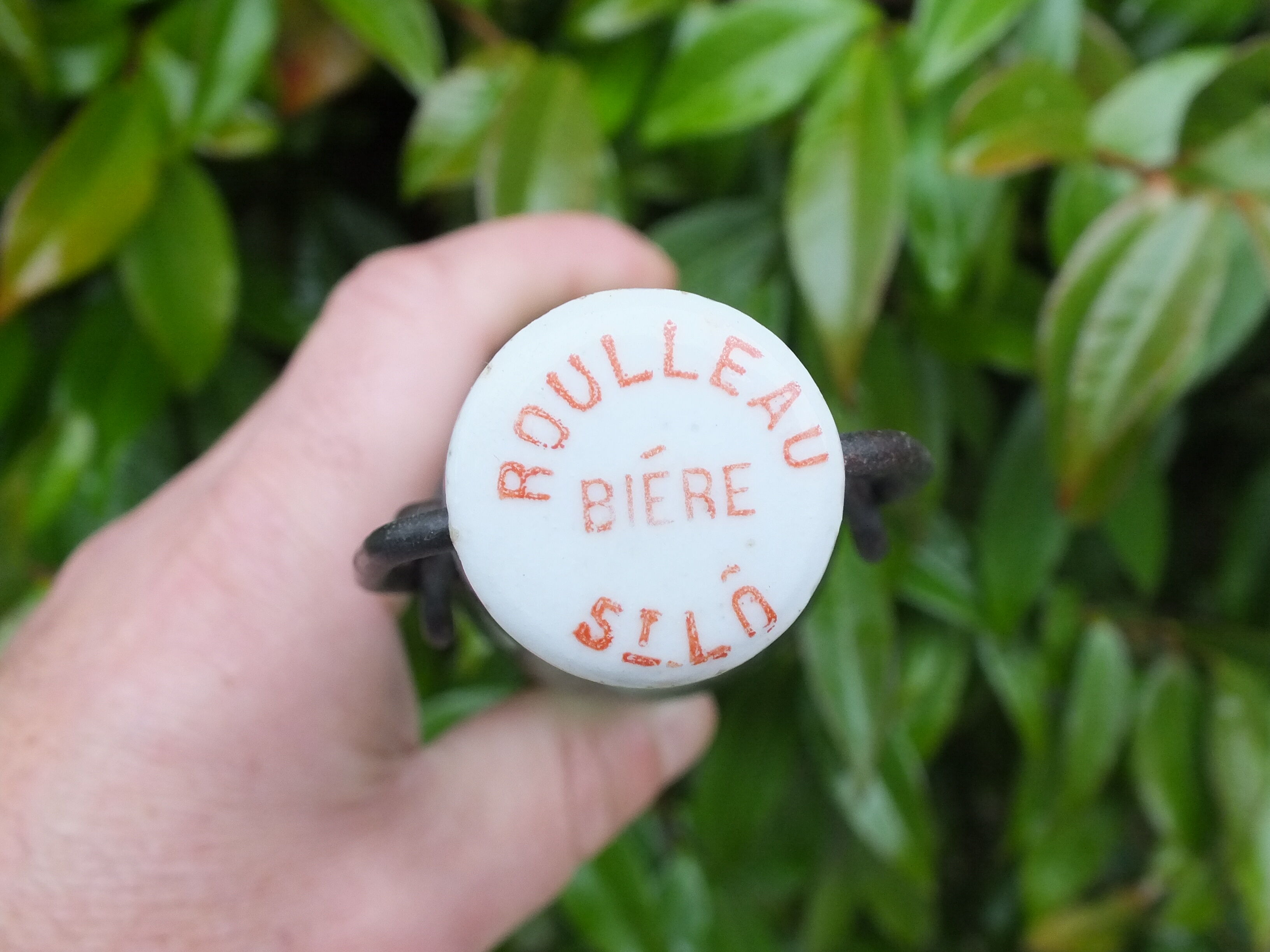 Old bottle of Roulleau beer in Saint Lô (Manche)
