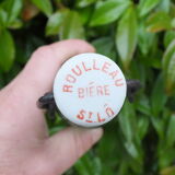 Ancienne bouteille de bière Roulleau à Saint Lô (Manche)
