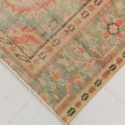 Tapis vintage rouge pâle