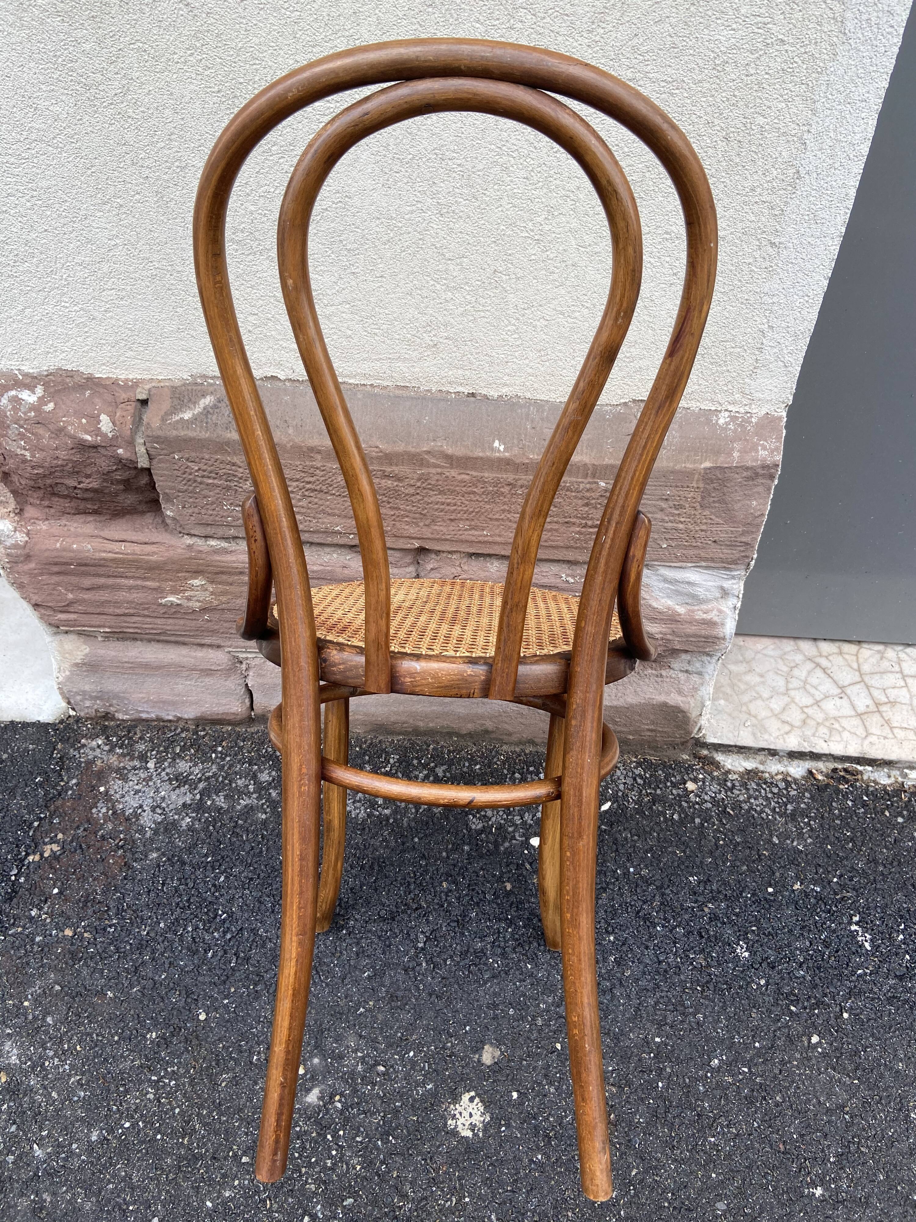 Vintage curved wooden bistro chair