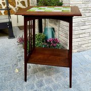 Art Nouveau side table 1910 with double tops in dark oak.