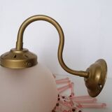 Pink glass wall lamp with garland of pearls