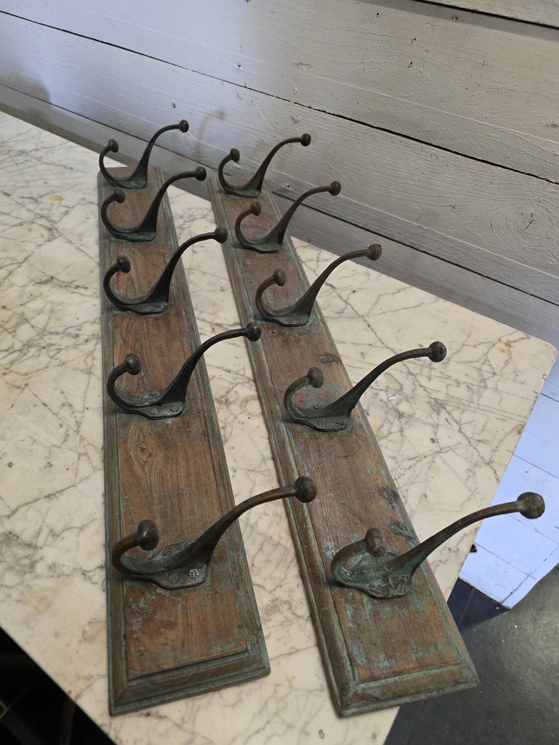 Wooden school coat rack and cast iron coat hooks