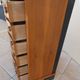 Louis XVI style chest of drawers in wood and cherry veneer.