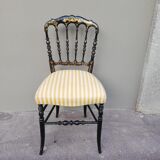 Napoleon III chair late 19th in blackened wood with gilded patterns