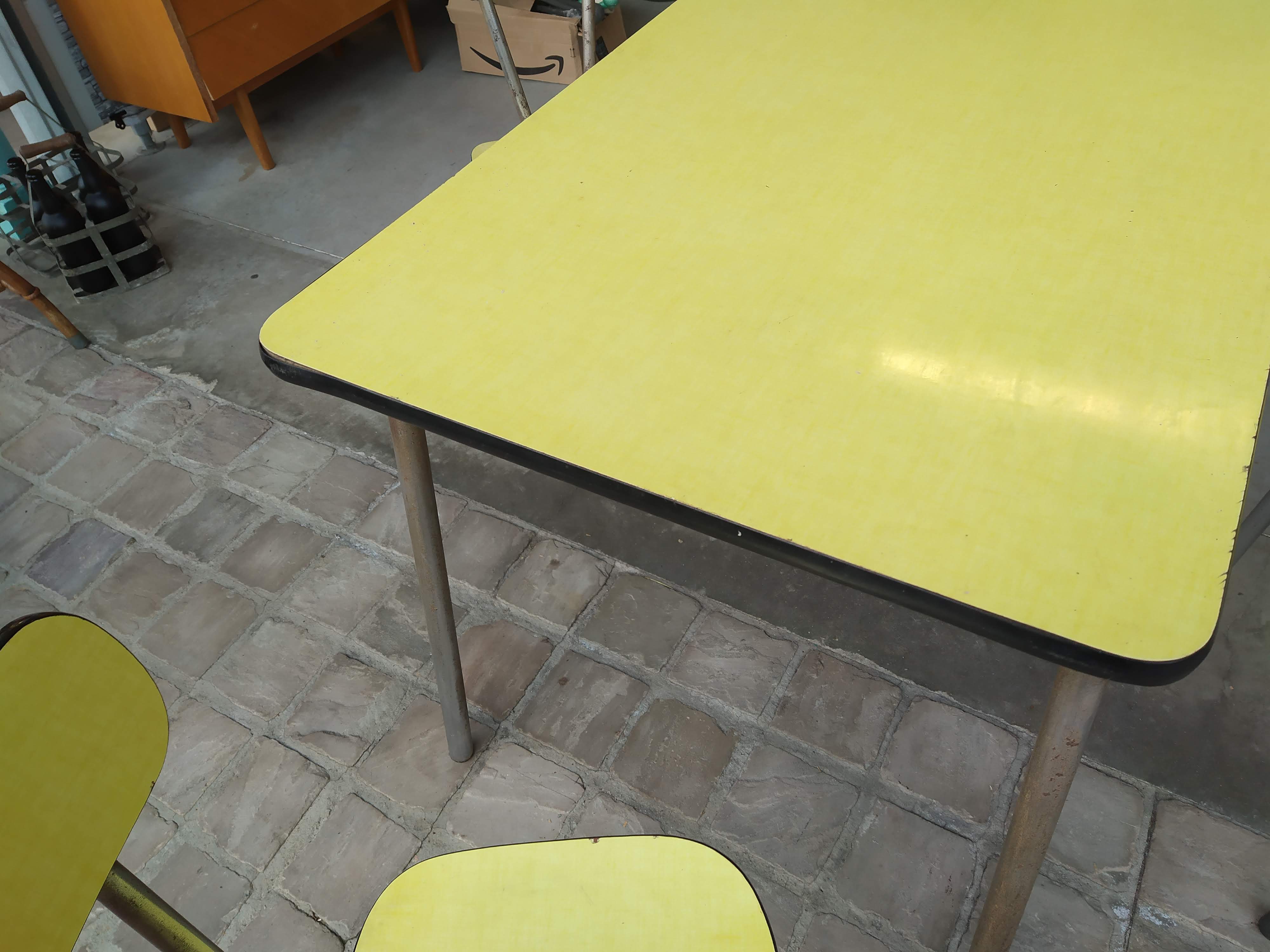 Table and chairs in 50s formica