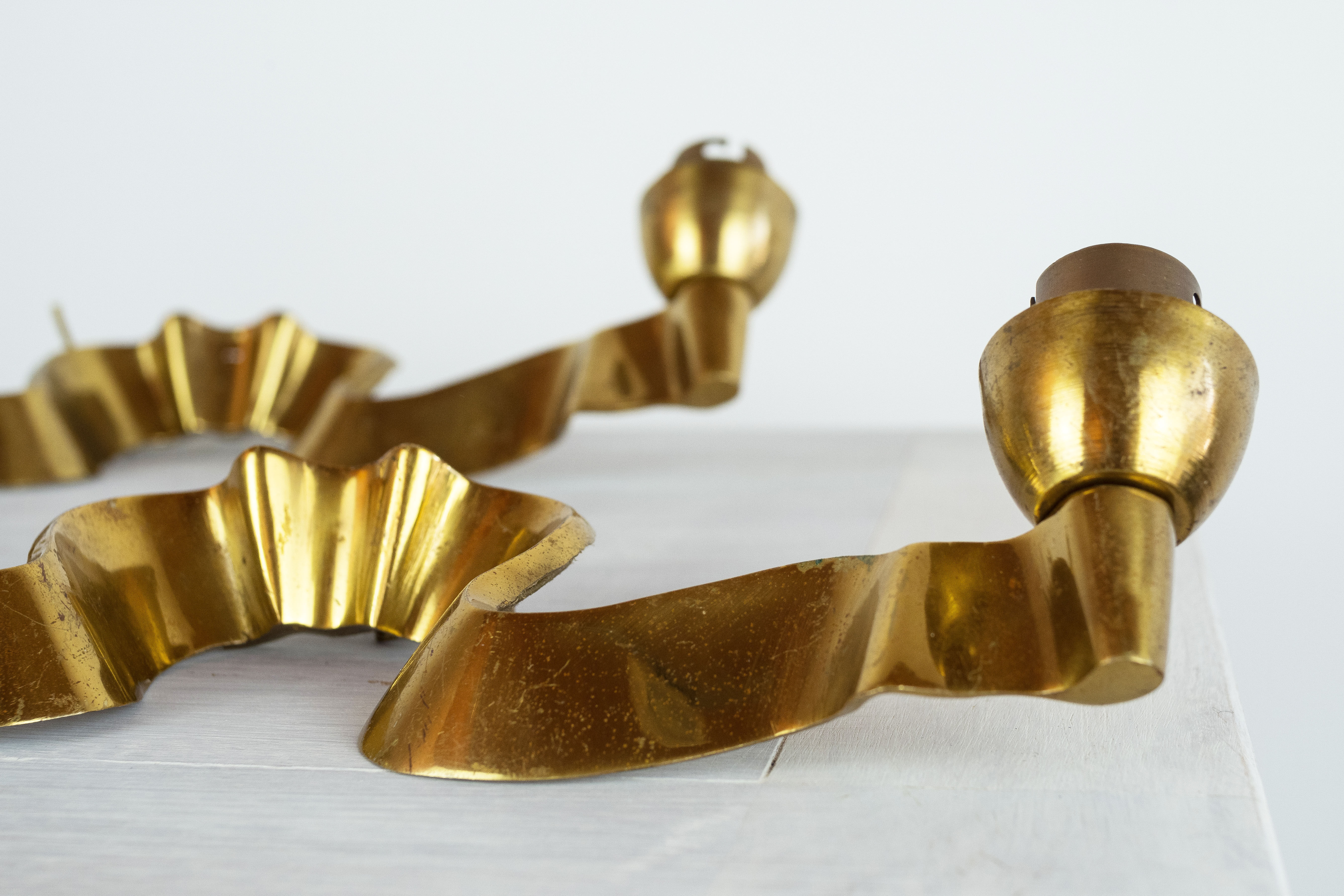 Pair of gilded bronze wall lamps, France, 1940