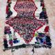 Vintage Boujaad wool table runner: red and black Moroccan rug.