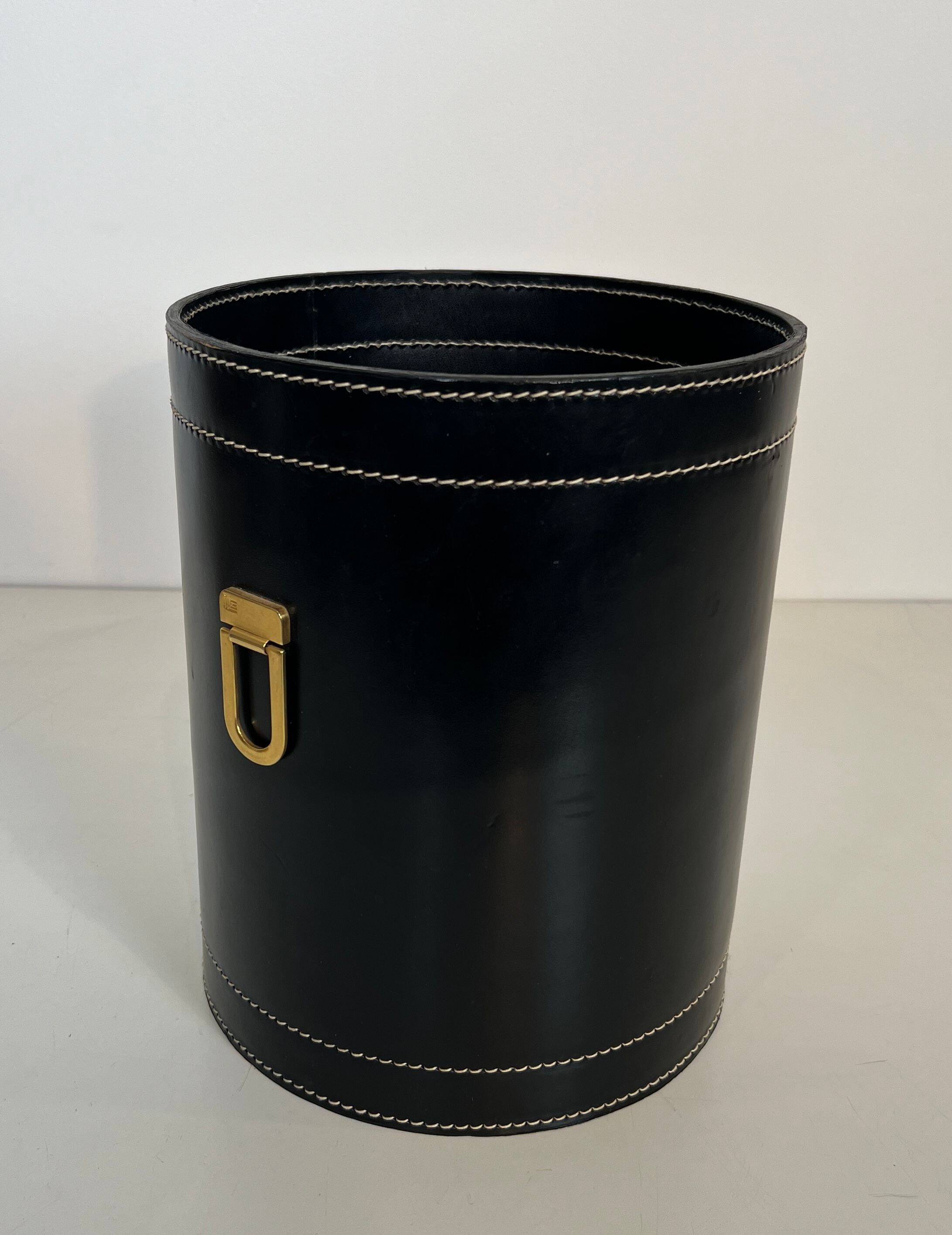 Black leather and brass desk basket