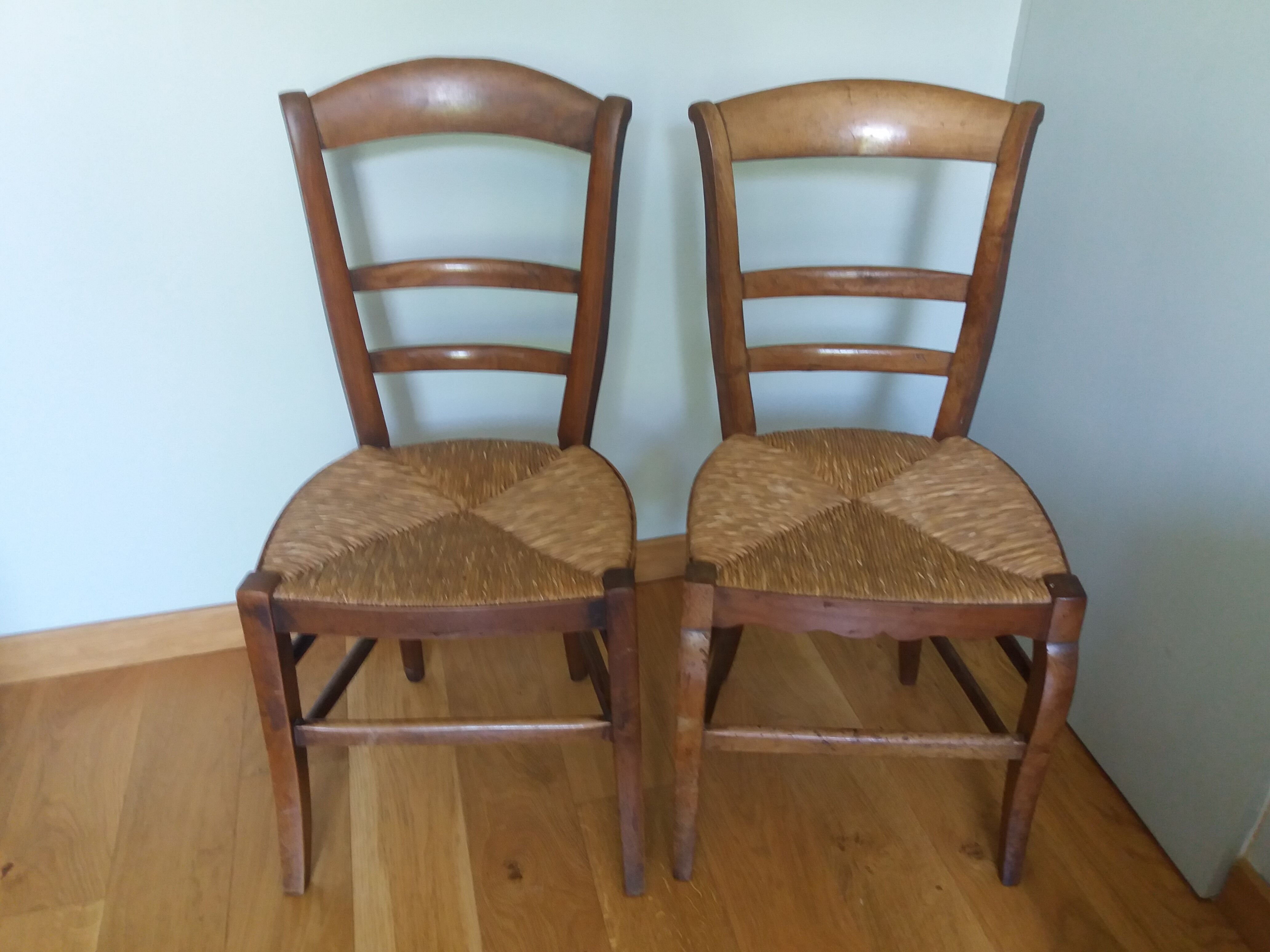 2 antique mulched chairs