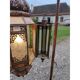 North African lantern suspension in brass and coloured glass.