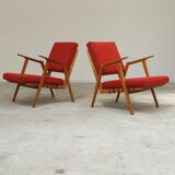 Pair of armchairs in mottled red and wood by Uluv, former Czechoslovakia 1960