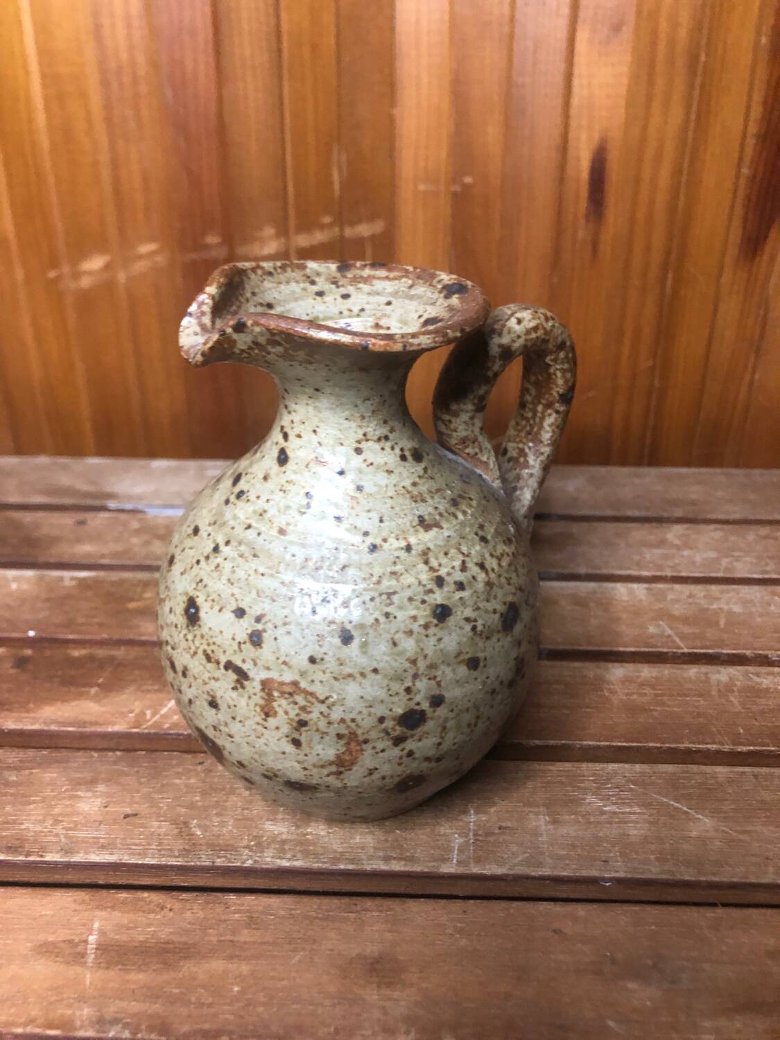 Old vintage brown stoneware pitcher