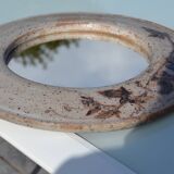 Round ceramic mirror signed