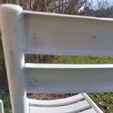 pair of white metal chairs, Tolix style