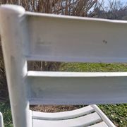 pair of white metal chairs, Tolix style