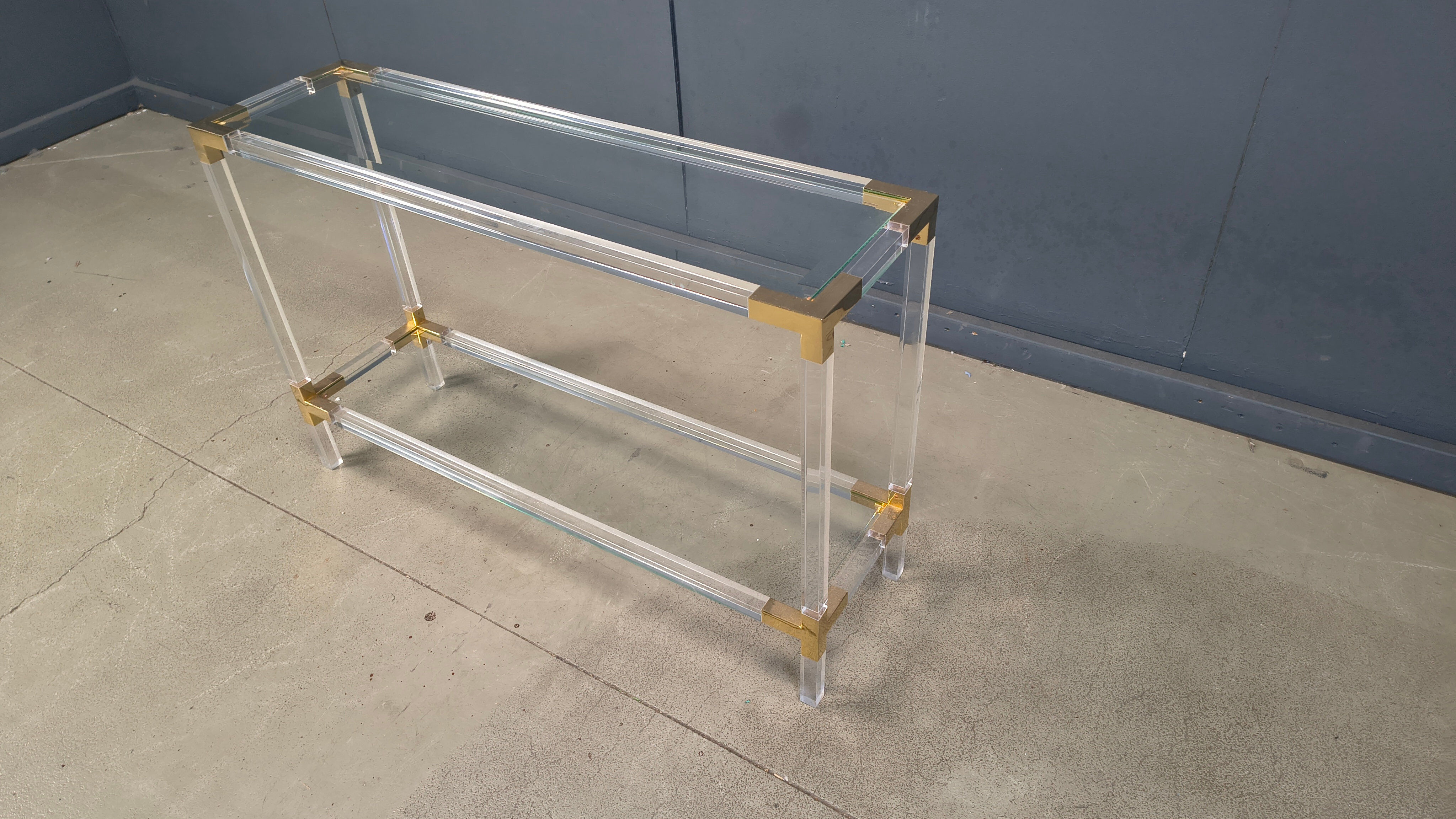 Brass and lucite console table, 1970s