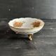 Pair of tripod bowls in gilded Limoges porcelain.