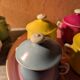 6 small porcelain cream pots from Limoges with a tray.