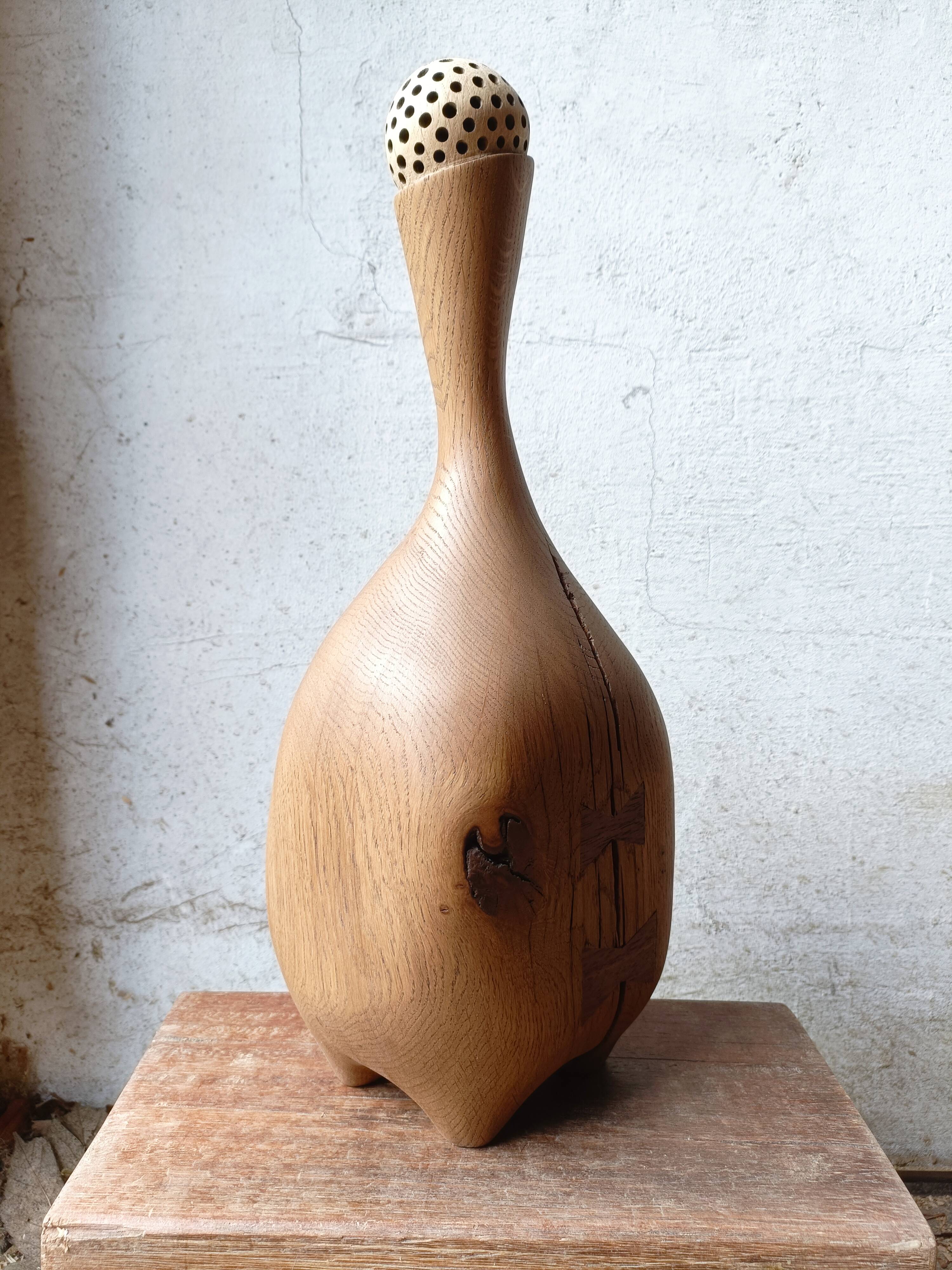 Set of two large solid oak sculptures.