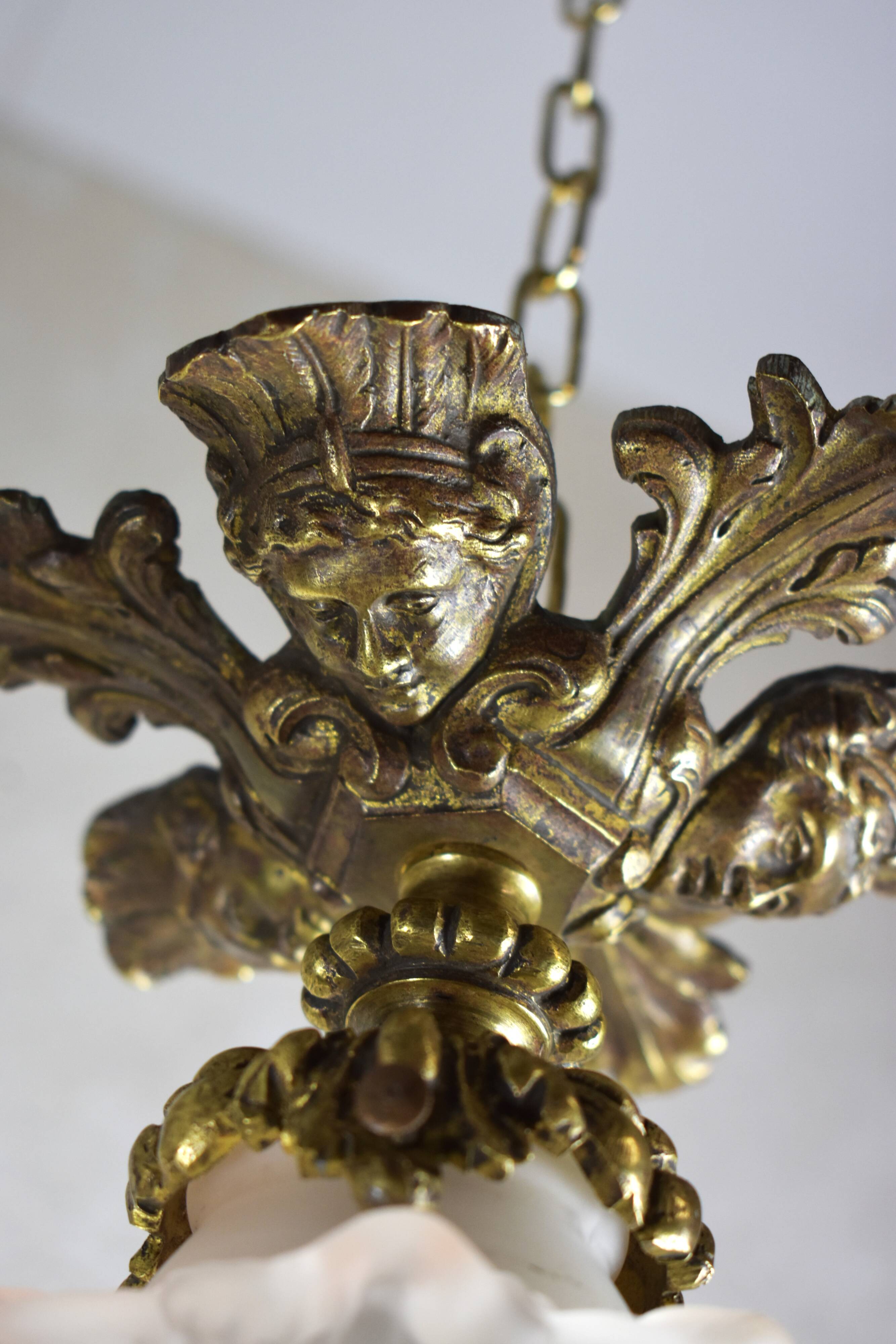 Suspension in bronze and glass paste.