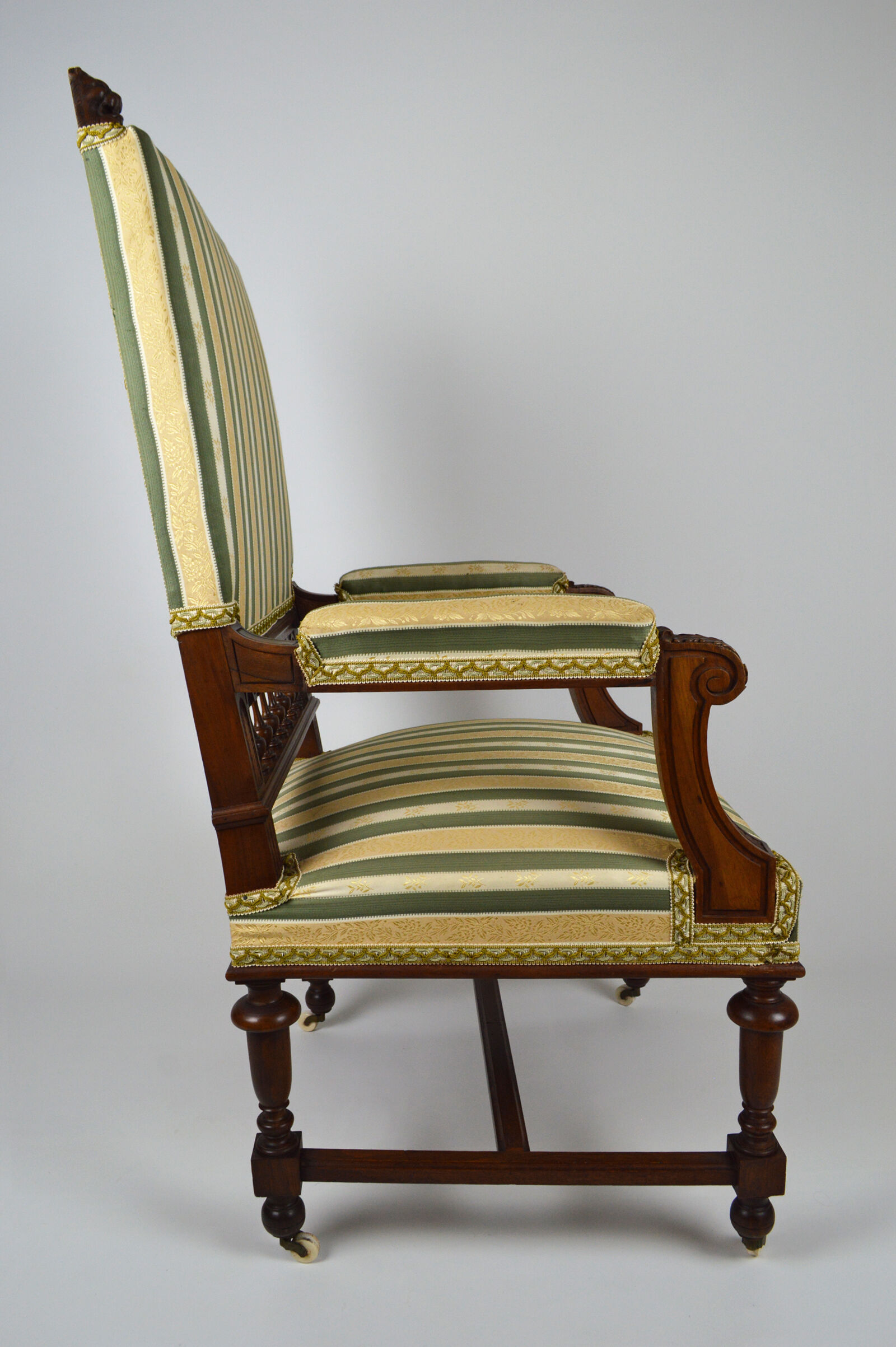 Neo-Renaissance walnut armchair with lion heads, circa 1880