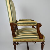 Neo-Renaissance walnut armchair with lion heads, circa 1880