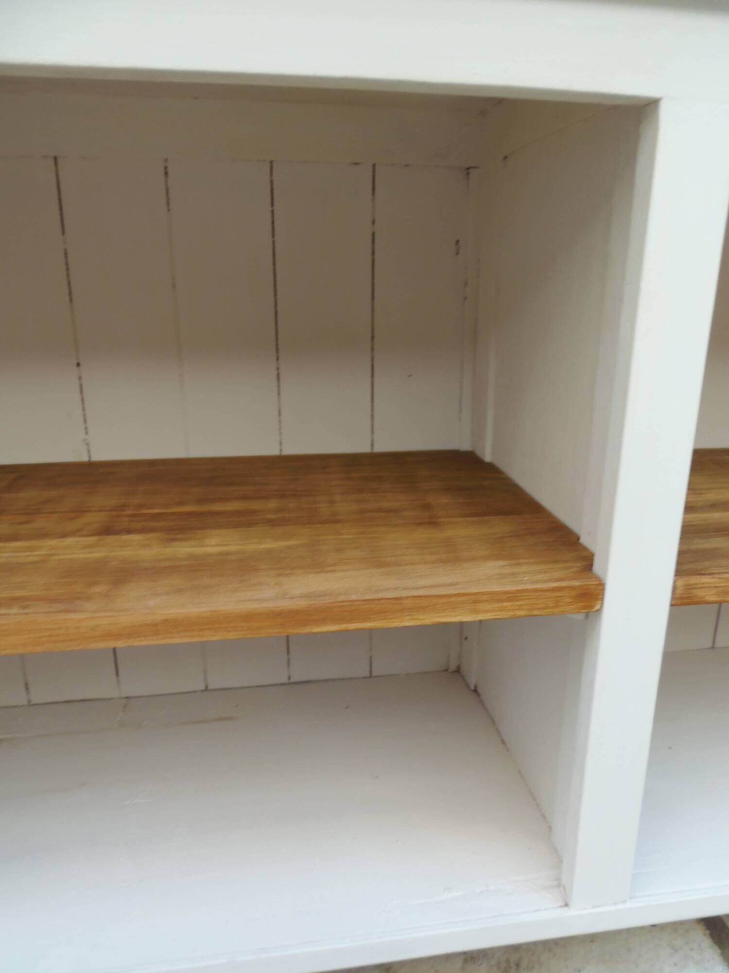 Craft furniture enhanced in pearl gray, shelves and top in raw wood.