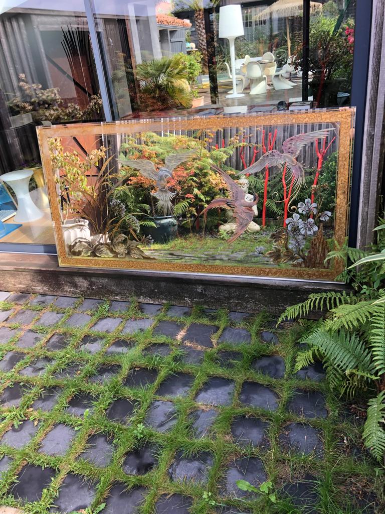 Mirror decorated with birds