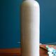 Enamelled white stoneware bottle
