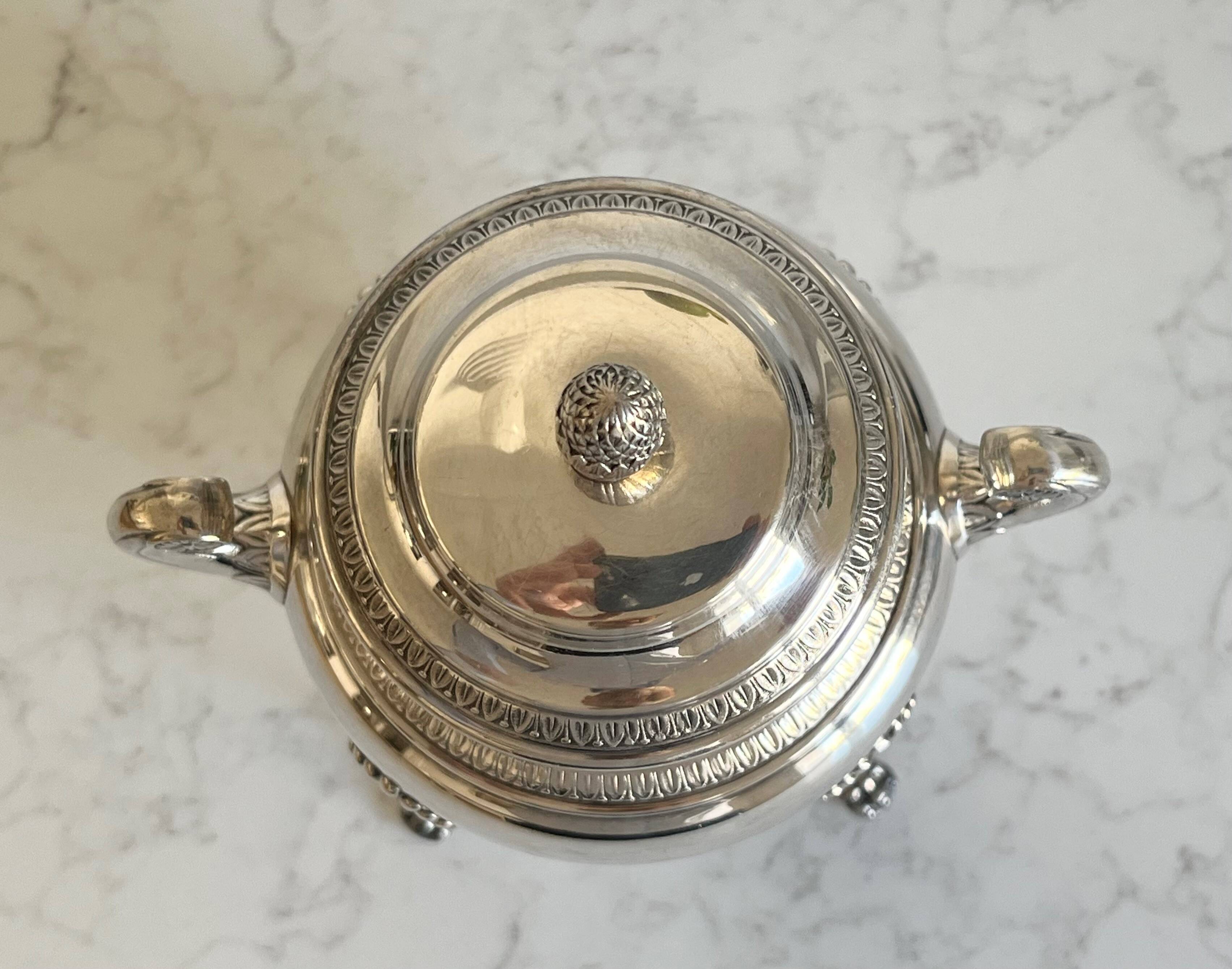 Ravinet d’Enfert silver-plated sugar bowl resting on 4 claw feet, Emp-style palmette motif