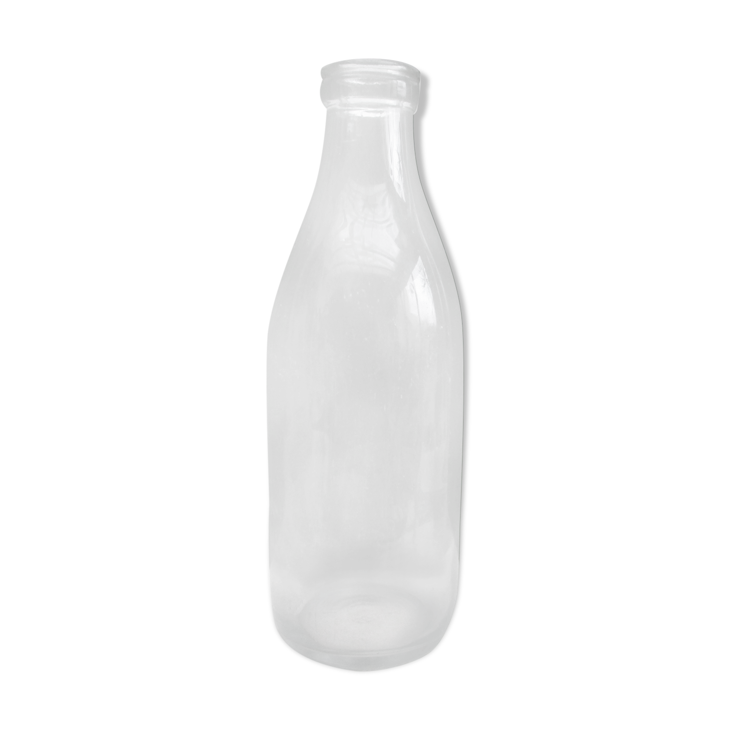 Vintage milk bottle in clear glass