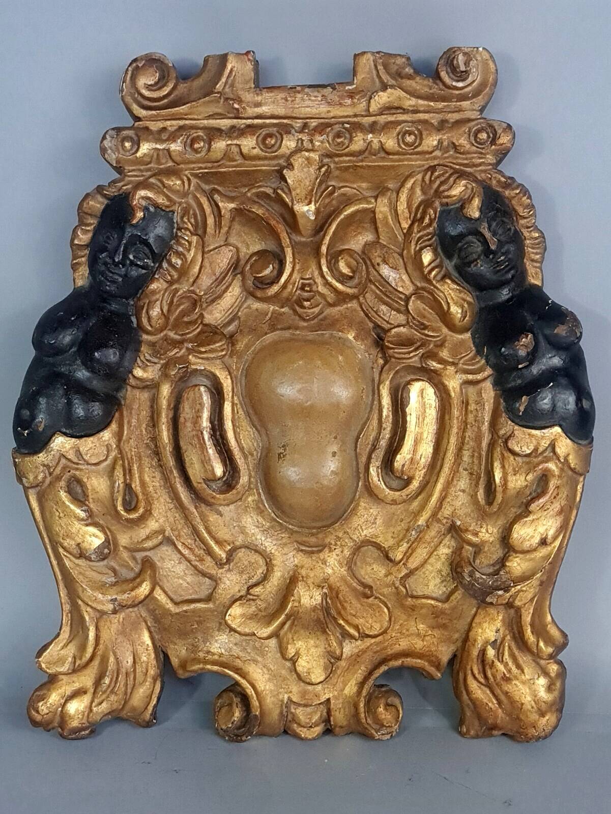 18th century carved wooden element, a cartouche surrounded by two women C478