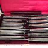 Set of 12 silver metal knives