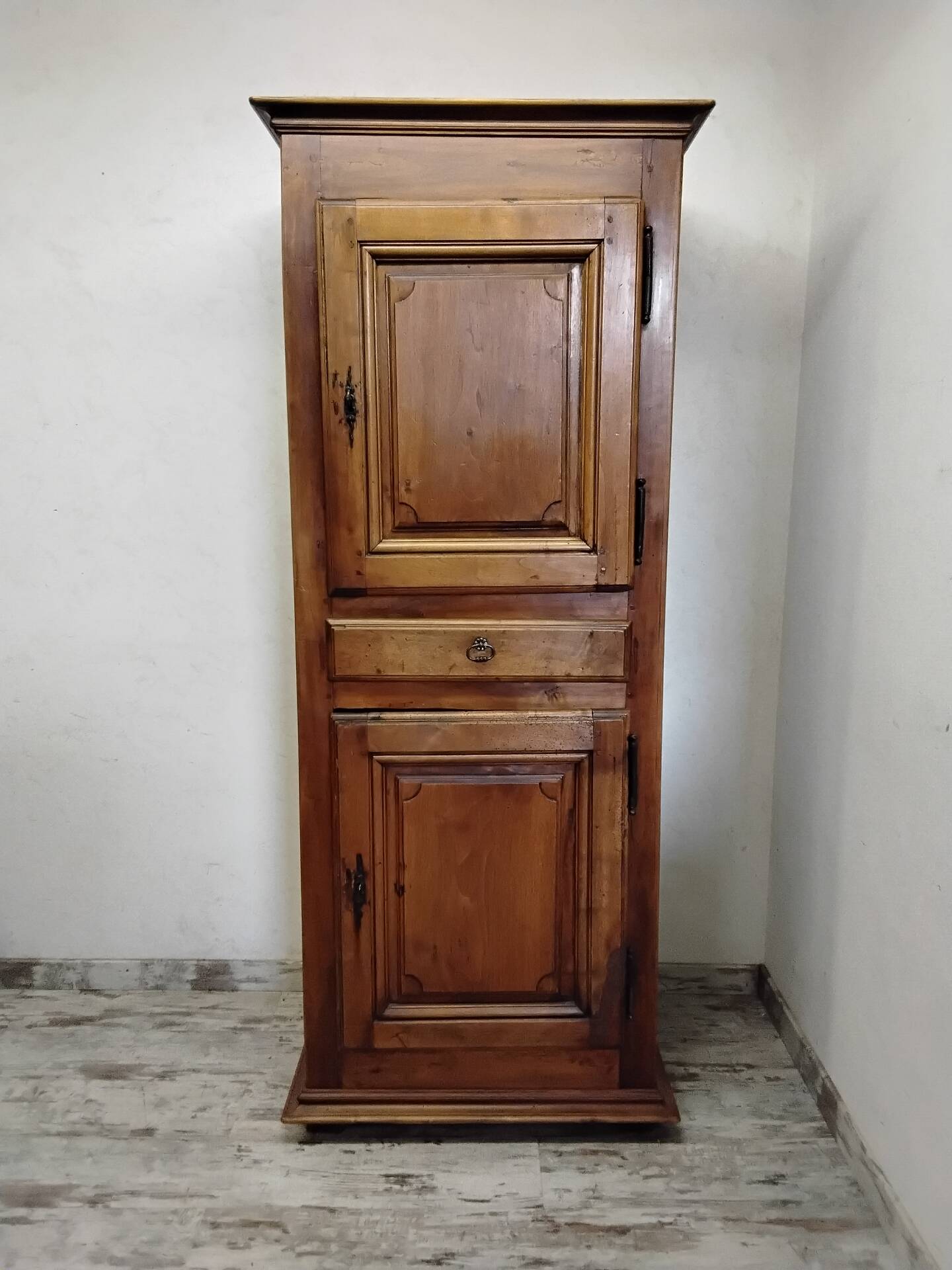 Antique wardrobe standing man