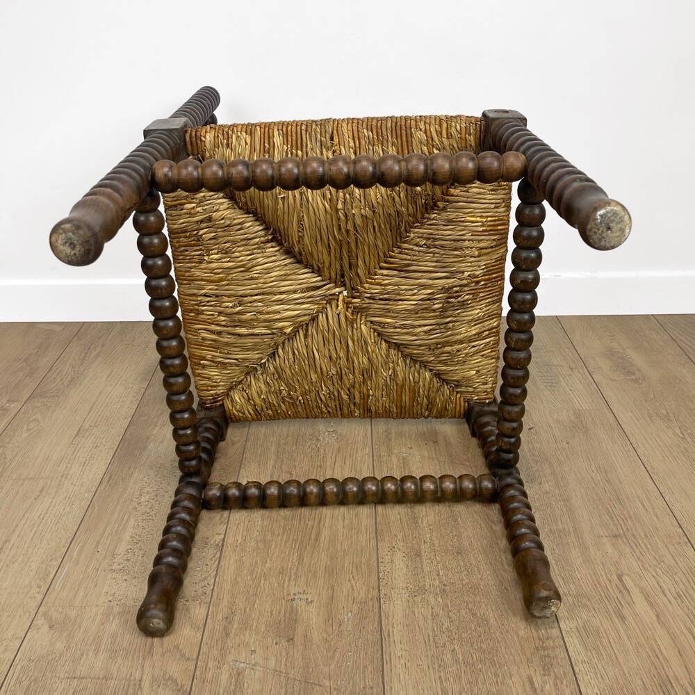 Old wooden ball fireside chair