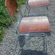 Pair of 1970s designer chairs in chrome metal and wood.